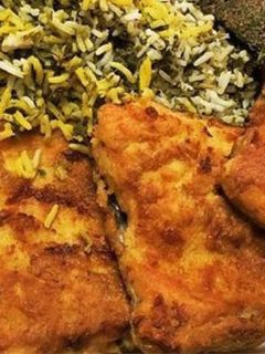 عکسی از دستور سبزی پلو با ماهی سرخ شده