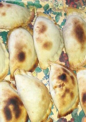 Una foto de Empanadas de carne y papas al horno