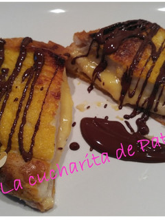 Una foto de Torrijas al horno rellenas de crema
