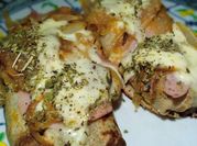 Una foto de canelones de espinaca y mozzarella