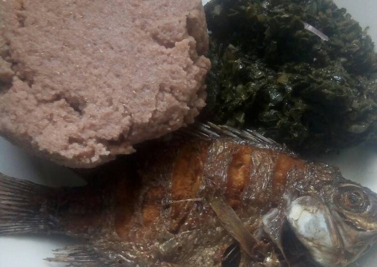 Simple deep fried fish with ugali and mchicha