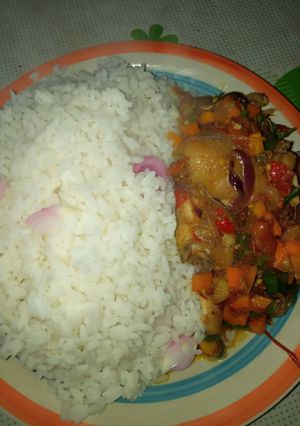 A picture of White rice with sauce.