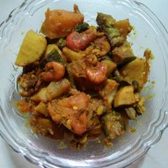 A picture of Pumpkin Arbi curry with seafood Assamese style.