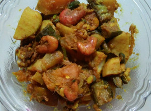 A picture of Pumpkin Arbi curry with seafood Assamese style.