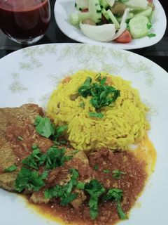 صورة لوصفة تونة 🐟 بالصلصة الحمراء مع ارز يا سلام😋