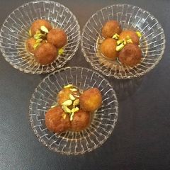 A picture of Sweet potatoes and paneer gulab jamun.