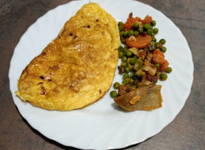Foto principal de Tortilla francesa jugosa de cebolleta, queso y atún