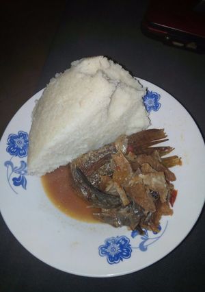 A picture of Stewed fish with ugali.