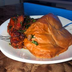 A picture of Moi moi,smoked pork meat with utazi.