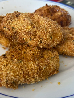 Una foto de Nuggets de pollo y calabacín Mambo