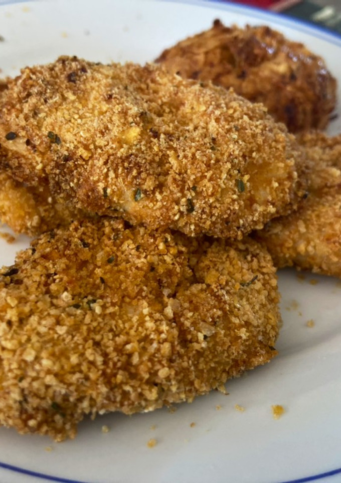 Una foto de Nuggets de pollo y calabacín Mambo