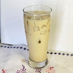 A picture of Kahlua ☕️ Milk 🥛with Nata De Coco 🥥.