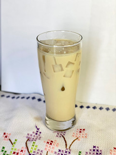 A picture of Kahlua ☕️ Milk 🥛with Nata De Coco 🥥.