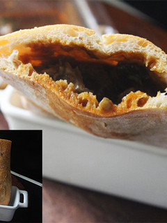Una foto de Bocadillo de callos con alcachofas