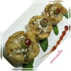 A picture of Cheesy veg macaroni muffins.