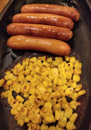 A picture of Oven Cooked Sausage and Corn.