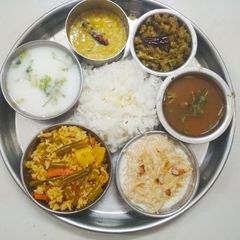 A picture of Authentic lunch during auspicious day.