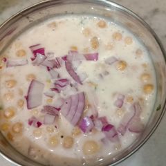 A picture of Boondi and onion raita.