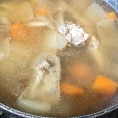 A picture of Chicken bone carcass broth.