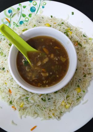 A picture of Chinese fried rice and manchow soup.