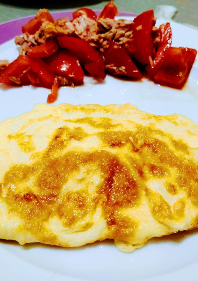 Una foto de Tortilla francesa rellena de queso