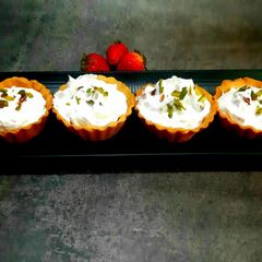 A picture of Fruits cream eggless tart.