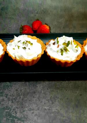 A picture of Fruits cream eggless tart.
