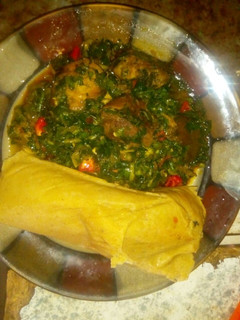 A picture of Moimoi and vegetable sauce.