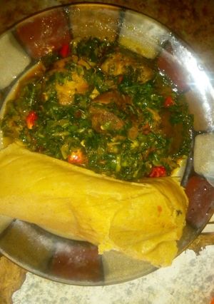 A picture of Moimoi and vegetable sauce.