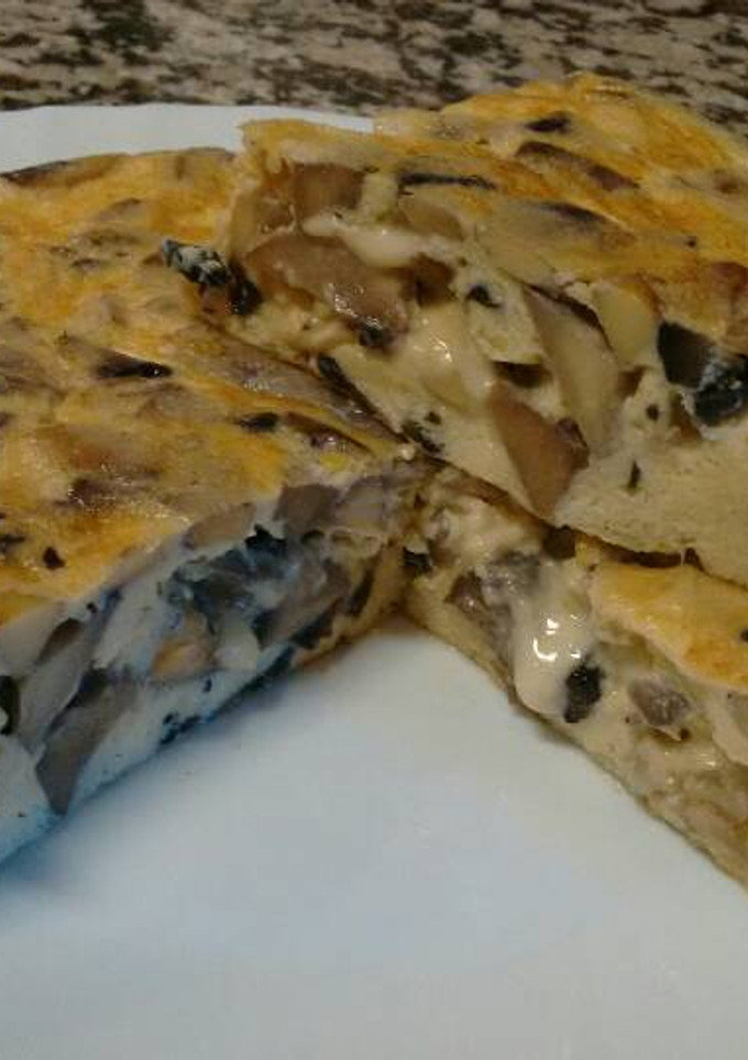 Una foto de Tortilla de champiñón y queso