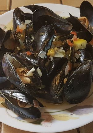 Una foto de Mejillones en tomate