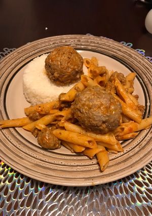 A picture of Penne Pasta with Meatballs in Puerto Rican-Style Sauce.