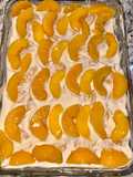 Pastel de limón con duraznos