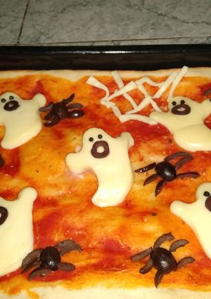Una foto de Pizza tenebrosa 🕷️👻