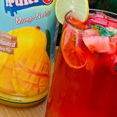 A picture of Watermelon with mango lemonade.