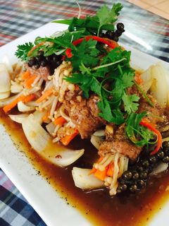 Hình của món Bò cuộn nấm kim châm.