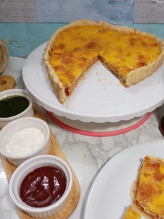 A picture of 3 layers chicken tart.