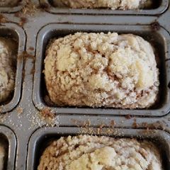 A picture of Pumpkin bread with crumble topping.