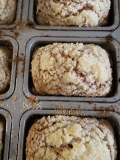 A picture of Pumpkin bread with crumble topping.
