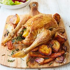A picture of Roast Chicken with Potatoes & Carrots.