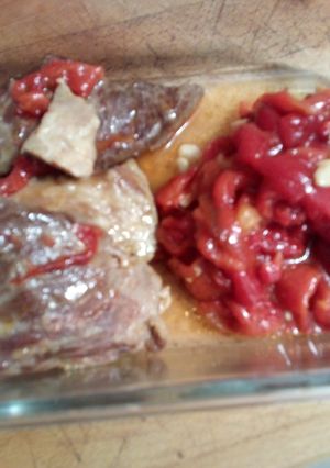 Una foto de Secreto a la plancha con pimientos