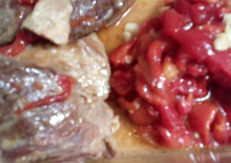 Secreto a la plancha con pimientos