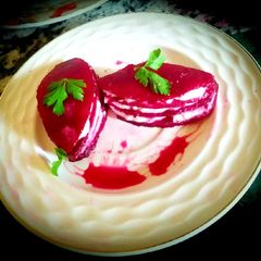 A picture of Thousand beet leaves with feta cheese flavored with herbs.