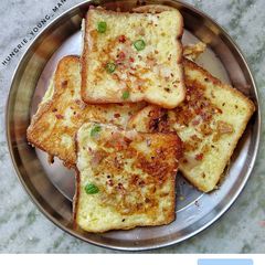 A picture of French toast with Indian twist.