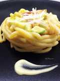 Bigoli con crema di zucchine, zucchine e cipollotti brasati