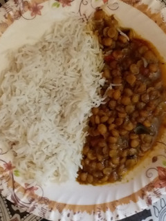 A picture of Chana daal with plain rice.