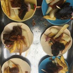 Fried yam and potatoes with snail A picture of Fried yam and potatoes with snail.