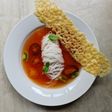 Tomato broth with vermicelli noodles and parmesan crisp
