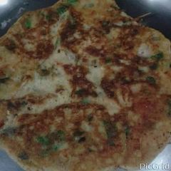 A picture of Rice dal Uttapam.