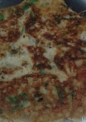 A picture of Rice dal Uttapam.